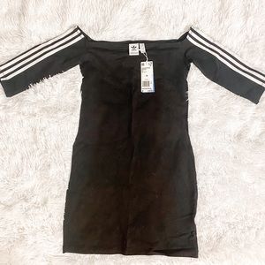 ADIDAS woman’s dress. Size M. never been worn.
